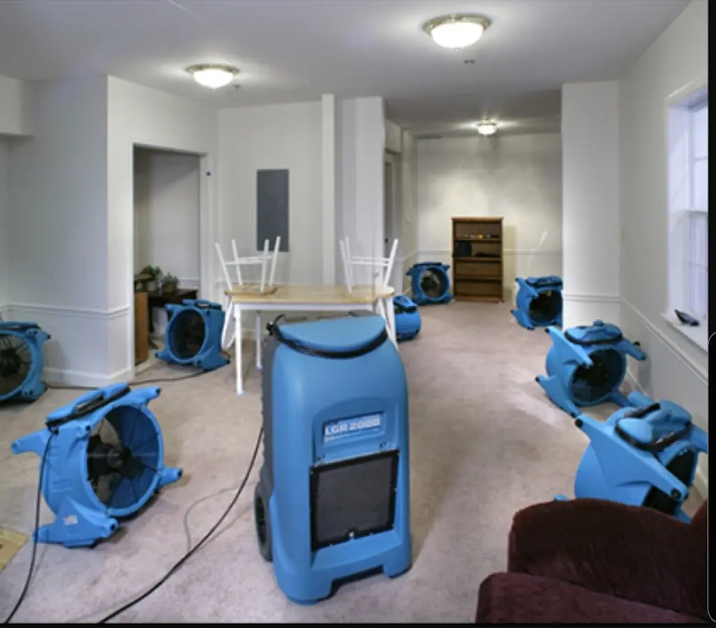 Air movers and dehumidifier setup for Water Extraction & Removal in Osceola